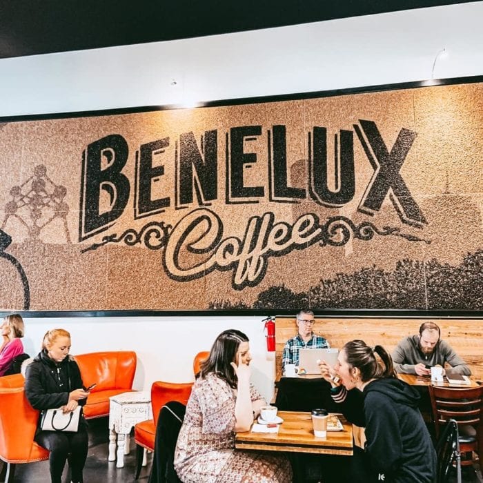 Coffee bean mural on the wall at Benelux Coffee, one of the best coffee shops in Raleigh, NC