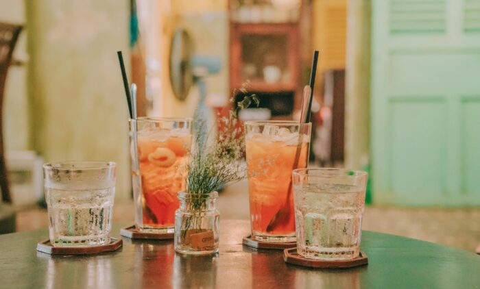 Group of drinks on a bar at one of the best cocktail bars in Raleigh